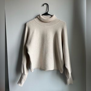 Ribbed Cream Turtleneck Sweater with Batwing Sleeves